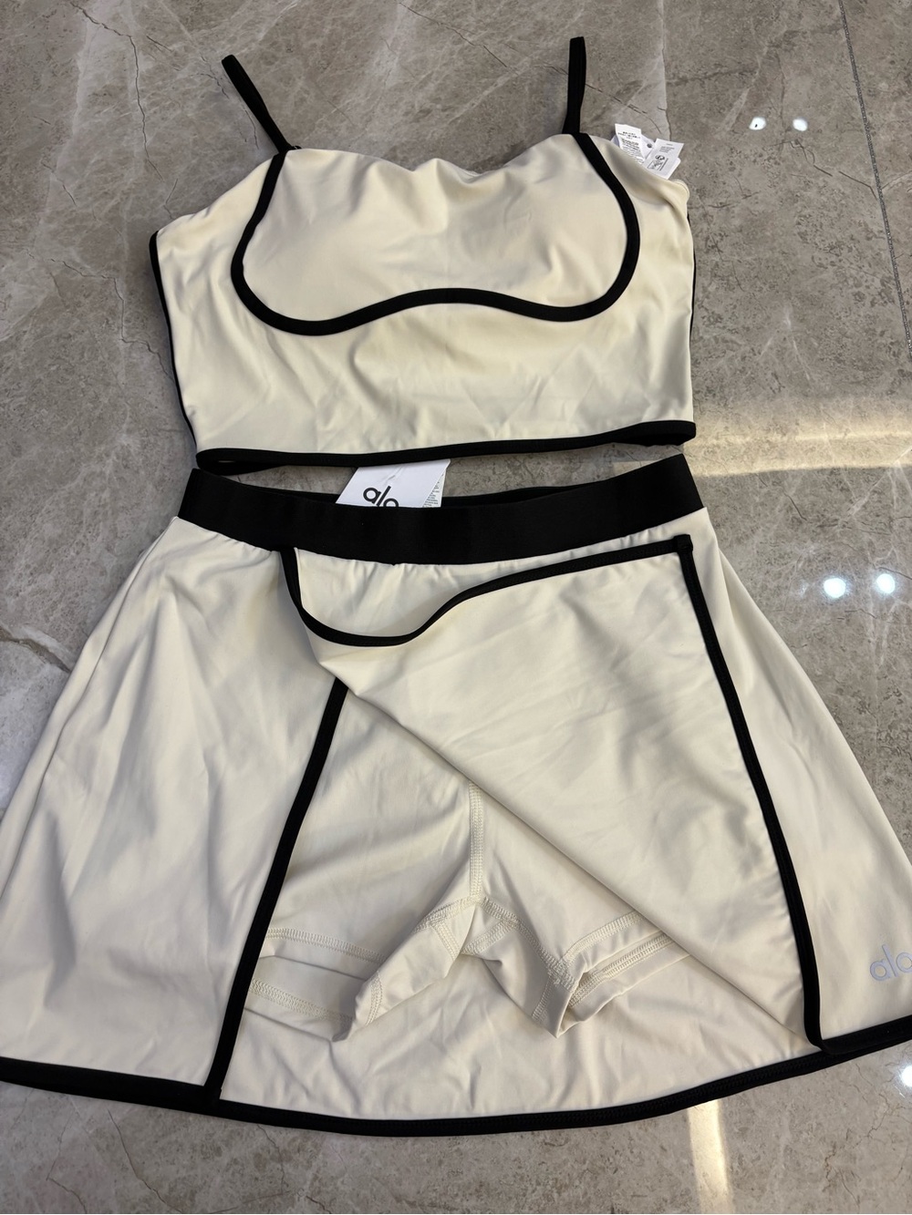 ALO Yoga Cream and Black Backless Crop Top & Skirt Set